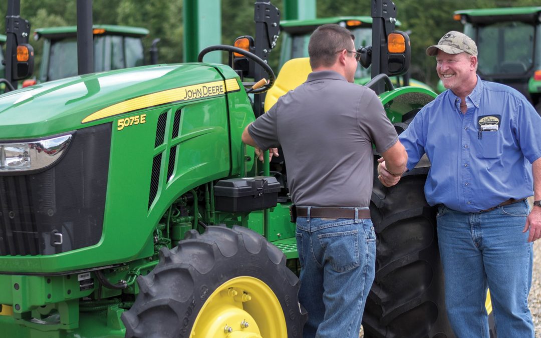 Shaking Hands After Tractor Deal