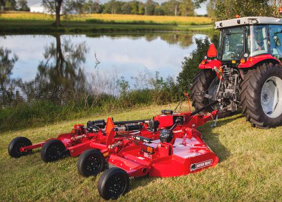 Bushhog Tractor With Attachment