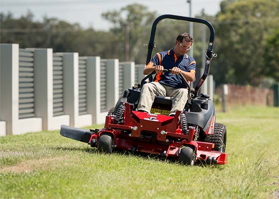 Man mowing with Ferris Riding Mower
