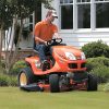 Kubota GR2020G Lawn Tractor - Man cutting grass