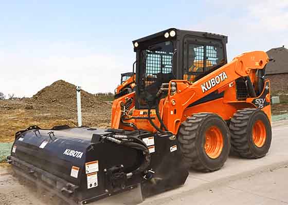 Kubota skid steer on road