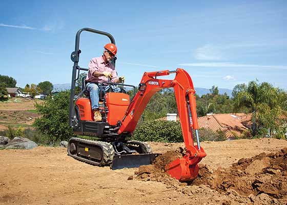 Man Digging Trench with Kubota K008-3T4 Compact Excavator