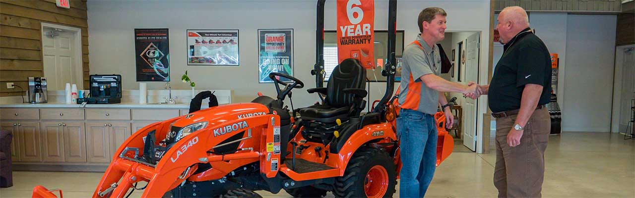 Kubota Dealer, Nelson Tractor Salesman and Customer shaking hands