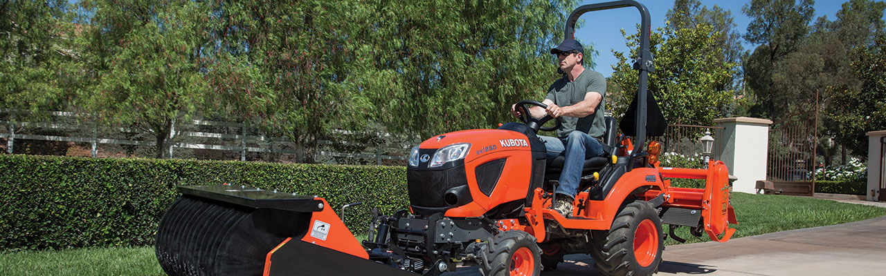 Man Driving Kubota Mower